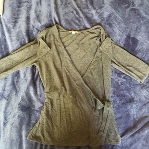 Grey sweater wrap top with 3/4 sleeve.
